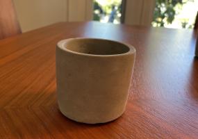 7, Small gray stone vase